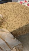 Off white linen tissue saree with green applique