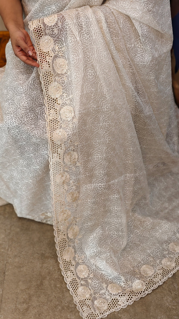 Cream shade cutwork saree