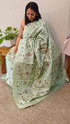 Mint green embroidered tussar silk saree