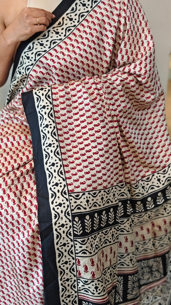 Red Semi crepe printed saree with black borders