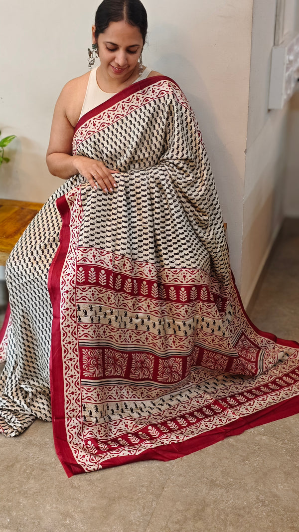 Black semi crepe saree with red borders