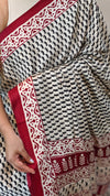 Black semi crepe saree with red borders