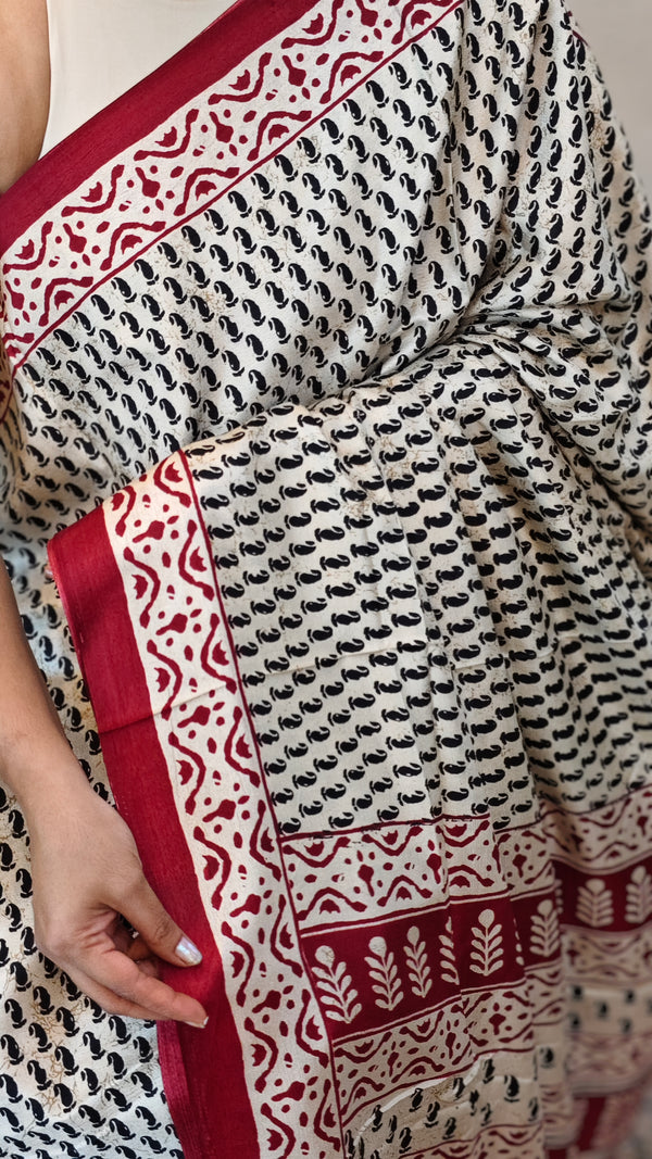 Black semi crepe saree with red borders