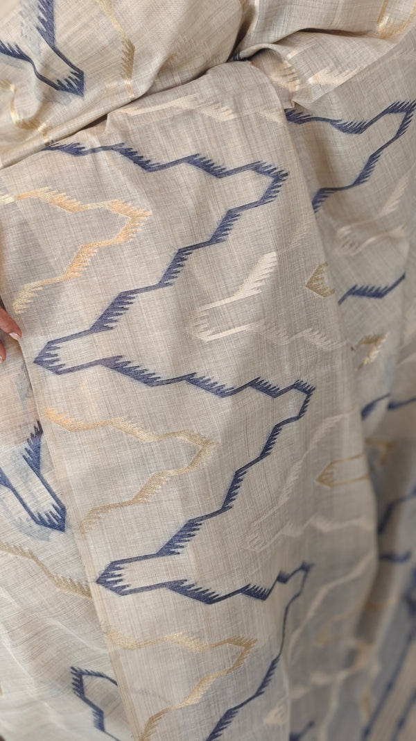 Beige and blue jamdani saree