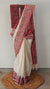 Block printed off white and red tepchi kota saree