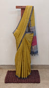Mustard tussar silk saree with block printed pallu