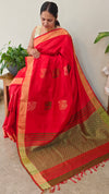 Reddish orange raw silk saree with elephant motifs