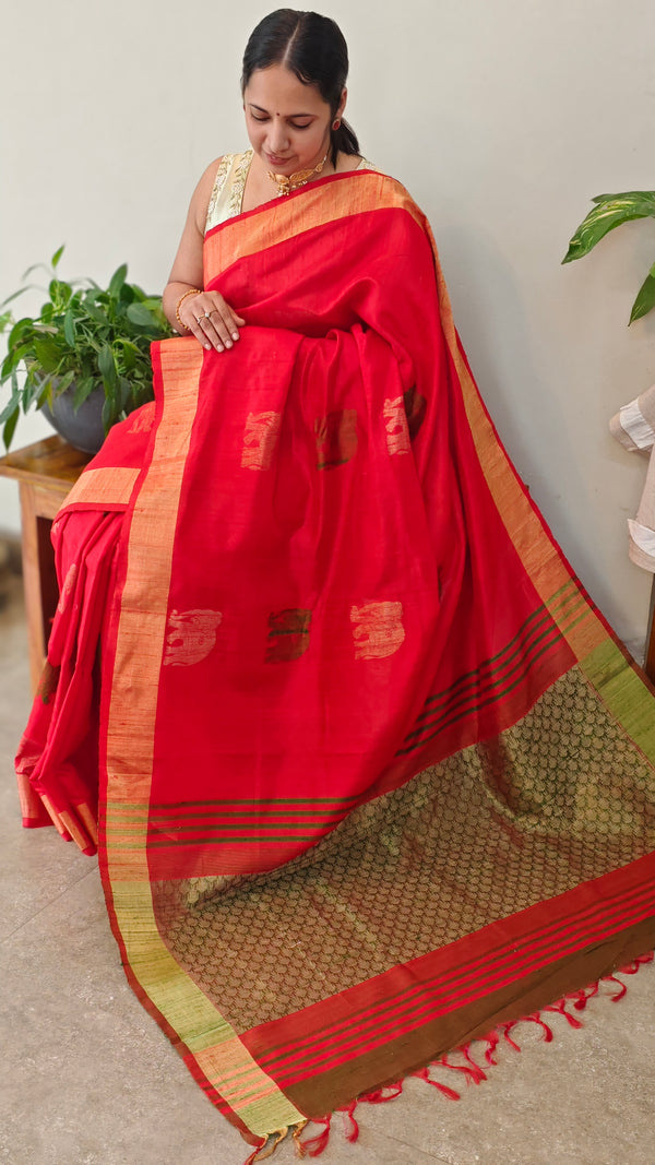 Reddish orange raw silk saree with elephant motifs