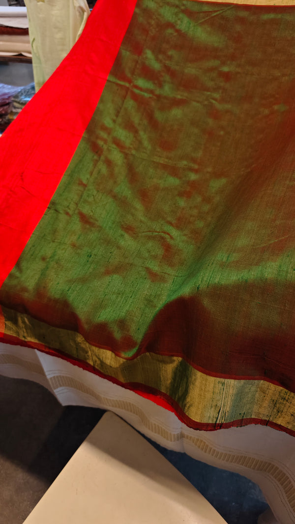 Reddish orange raw silk saree with elephant motifs