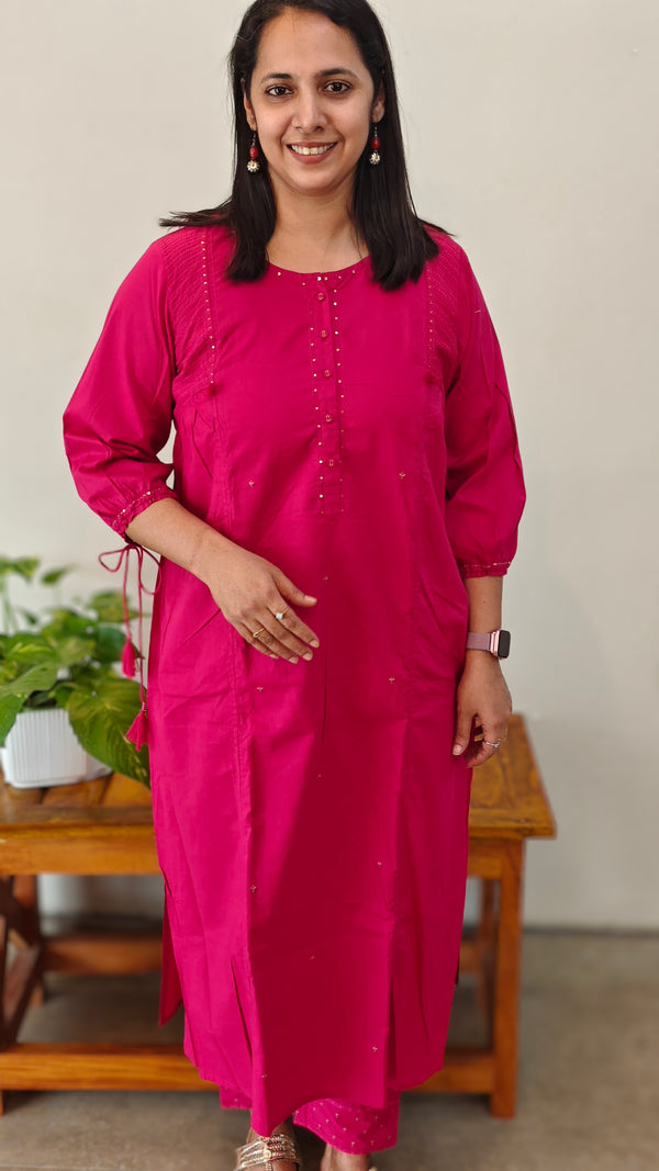 Dark pink top and bottom stitched suit