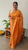 Amber shade Check Tussar silk saree