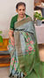 Bluish grey tussar floral printed tussar silk saree with cutwork pallu