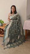 Muted moss green banarasi crepe saree