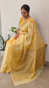 Yellow embroidered and block printed organza saree