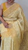 Yellow embroidered and block printed organza saree