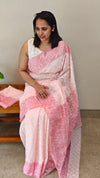 Baby pink block printed embroidered organza saree