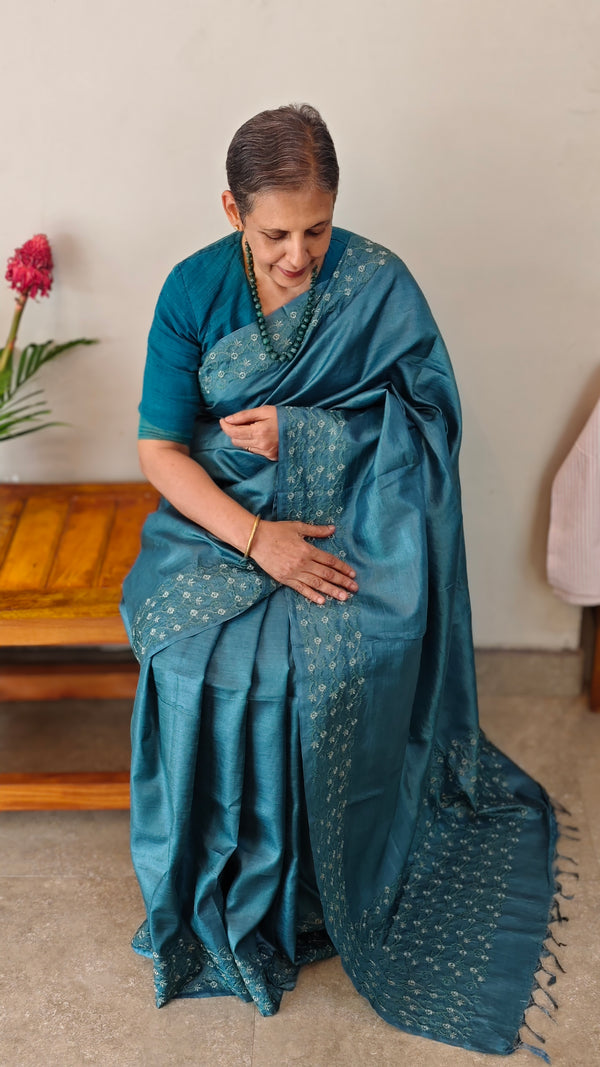 Turquoise embroidered tussar silk saree
