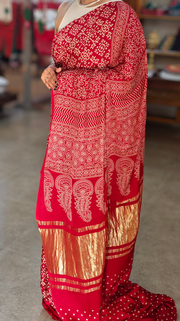 Red bandini print modal silk saree