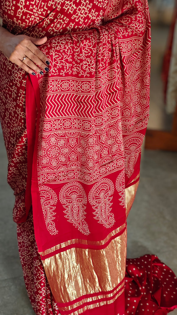 Red bandini print modal silk saree