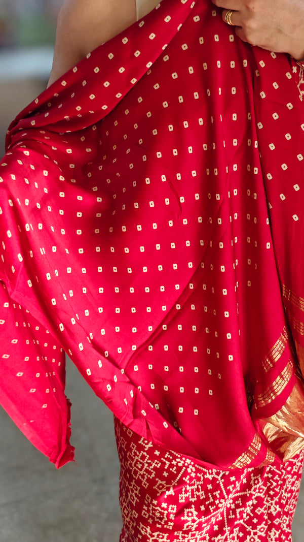 Red bandini print modal silk saree