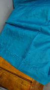 Cyan blue hand embroidered tussar silk saree