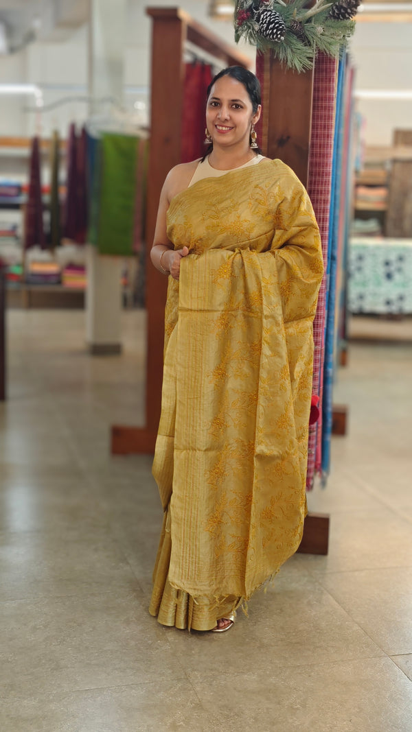 Yellowish green embroidered tussar silk saree with kantha work