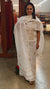 Beige chikankari on off white net kota suit