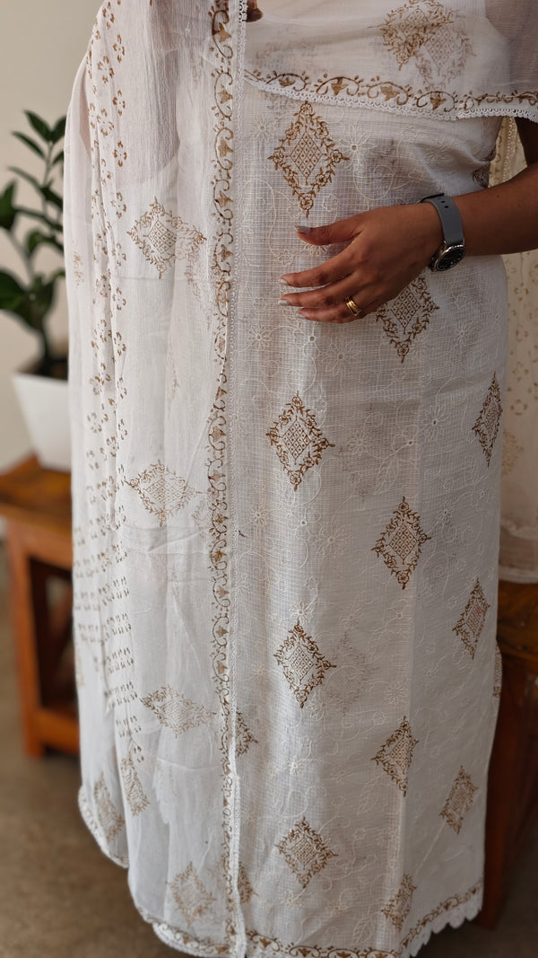 White and mustard net kota suit with chiffon dupatta