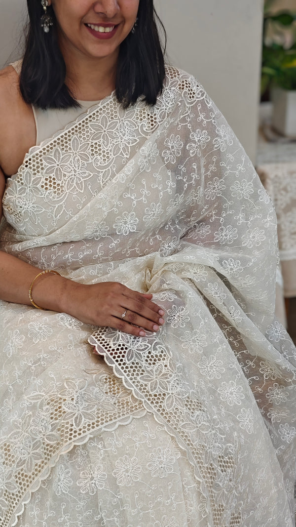 Off white tepchi kota cutwork saree