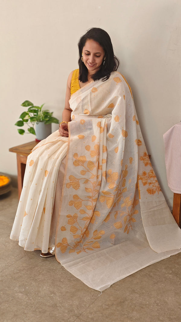 Off white and mustard jamdani saree