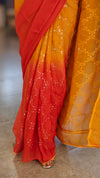 Mustard and rust orange viscoe organza saree