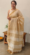 Light beige checked tussar silk saree