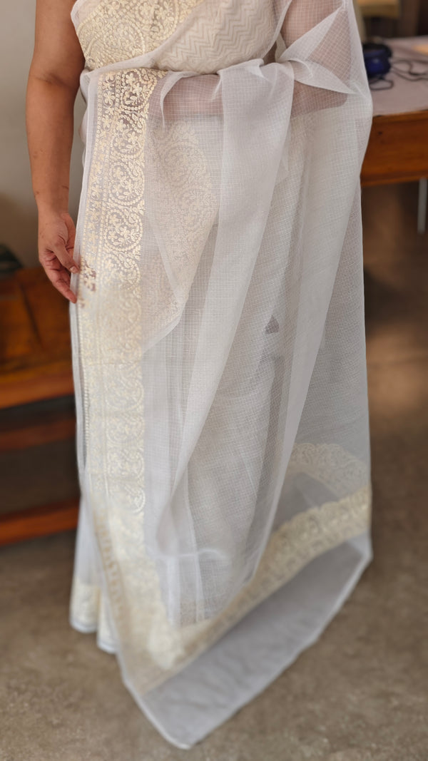 Off white and light yellow net kota saree