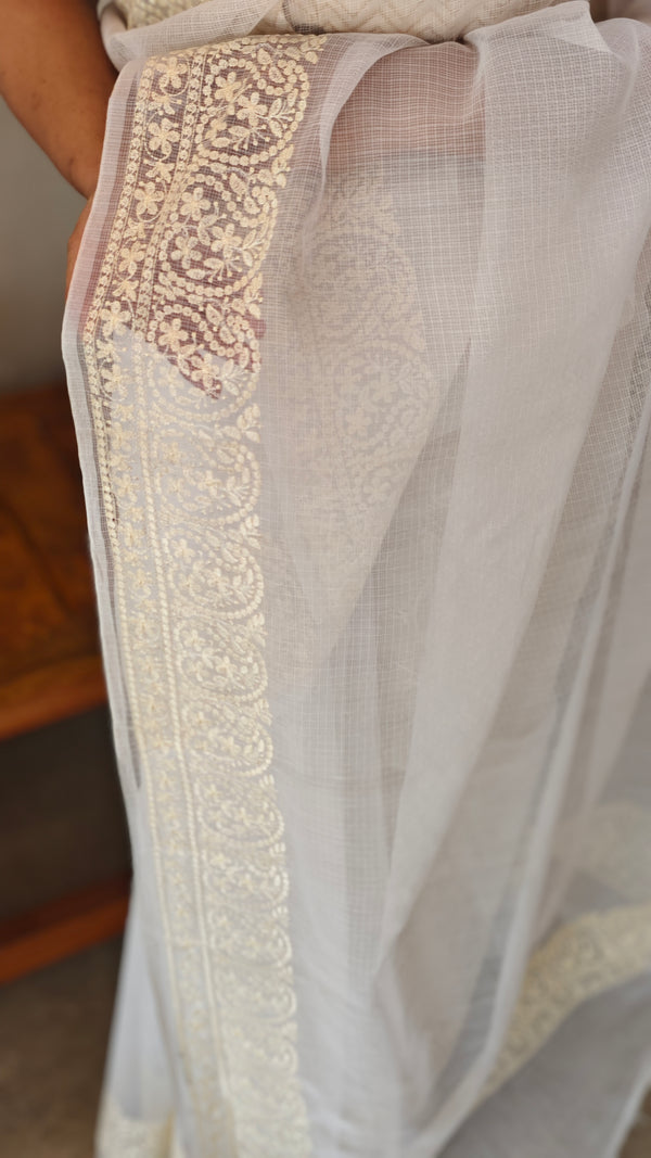Off white and light yellow net kota saree