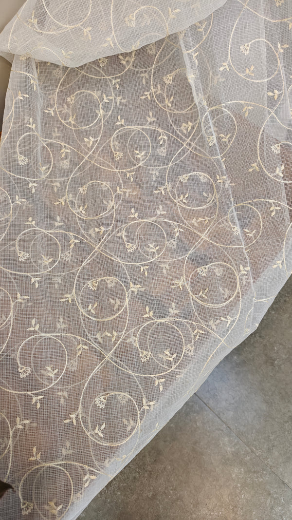 Off white and light yellow net kota saree