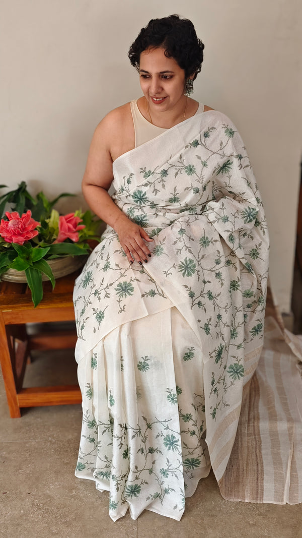 Green floral cross stitch embroidery on off white tussar silk saree - CST24