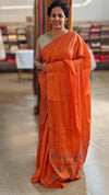 Orange muslin silk saree with hand embroidery