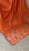 Orange muslin silk saree with hand embroidery