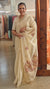 Cream linen tissue hand embroidered saree