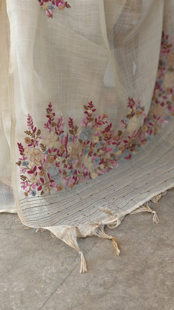 Cream linen tissue hand embroidered saree