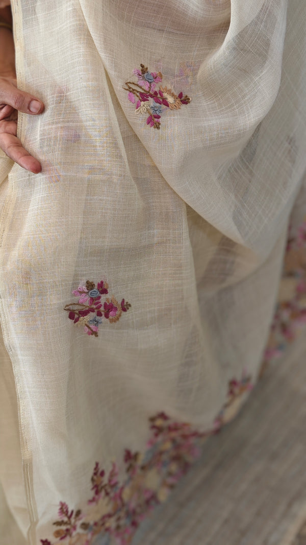 Cream linen tissue hand embroidered saree