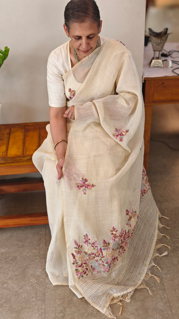 Cream linen tissue hand embroidered saree