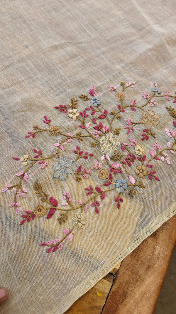 Cream linen tissue hand embroidered saree
