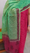 Maroon and green suit