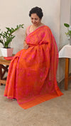 Orange and pink embroidered net kota saree