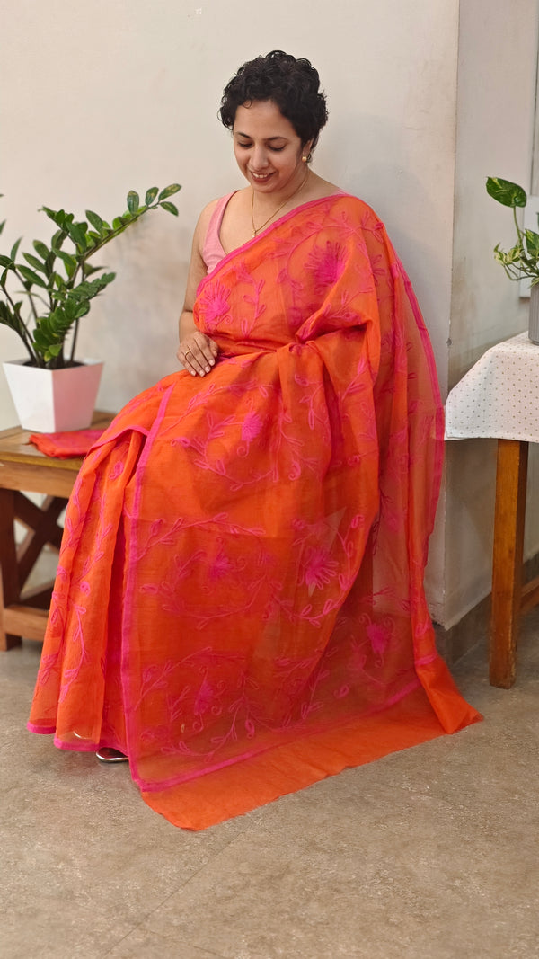Orange and pink embroidered net kota saree