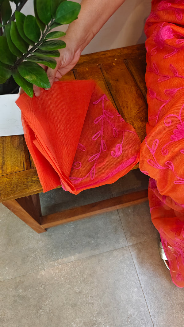 Orange and pink embroidered net kota saree