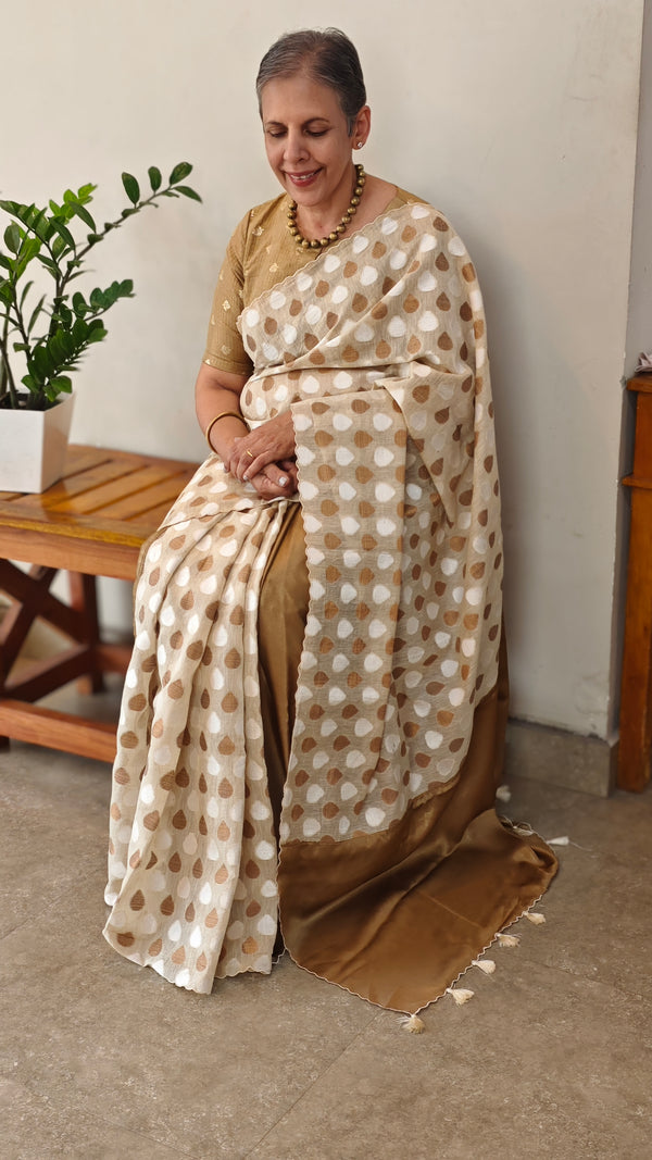 Cream and golden satin party wear saree