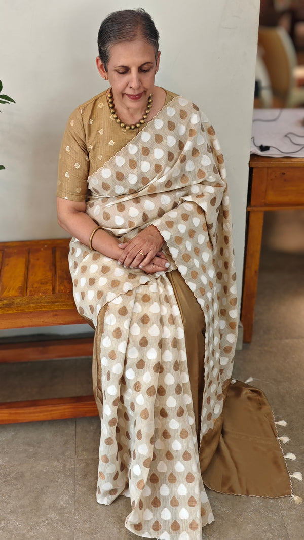 Cream and golden satin party wear saree