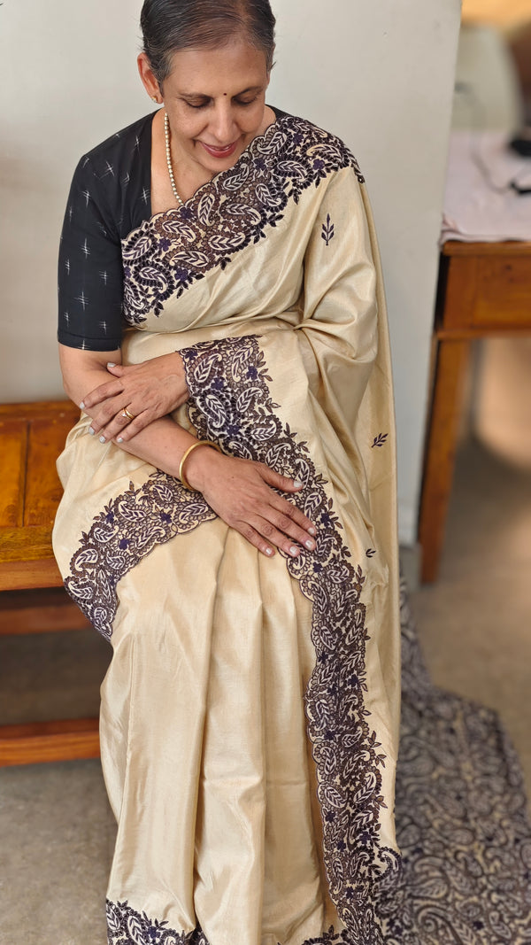 Beige semi silk cutwork saree